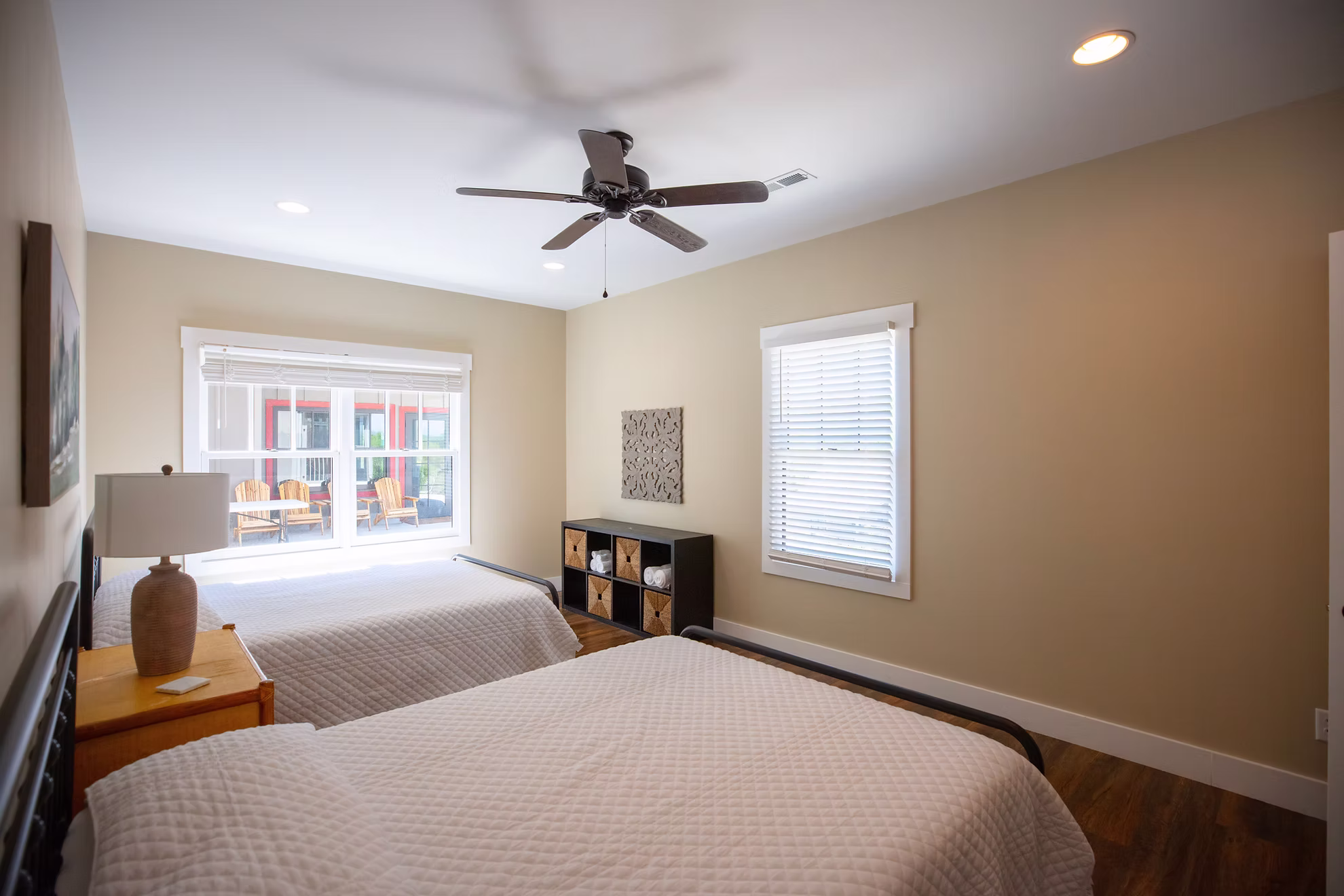 Another cottage bedroom with two queen beds